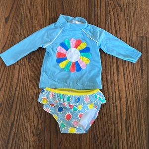Flower power swim suit rash guard and ruffled bottoms